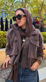 Soft fur  cropped jacket in a brown color.