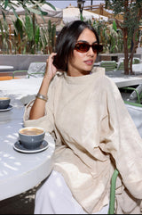 Beige stitched cotton poncho