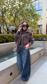 Soft fur  cropped jacket in a brown color.